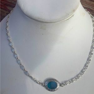 Silver plated snail link necklace with cobalt stone pendant